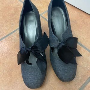 Grey heels with black bow strap
